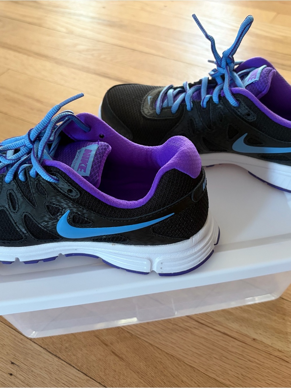 Nike Black Sneakers with Blue Swoosh and Purple Lining